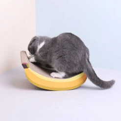Banana Shaped Cat Scratching Pad -A Great Coffee Shop cat playing with banana shaped cat scratching pad